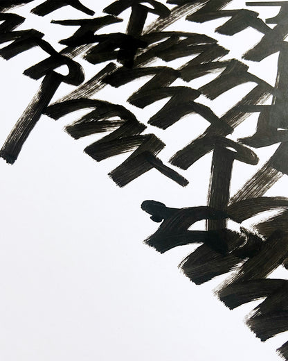 Detailaufnahme der Handschrift in schwarzer Acrylfarbe auf weißem Papier